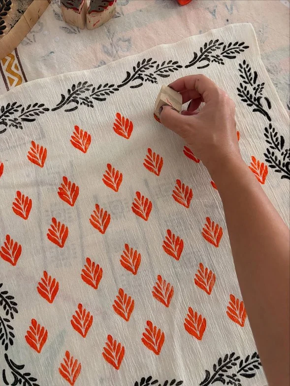 Guests creating hand-printed canvas tote bags at Vassum Live block printing stall